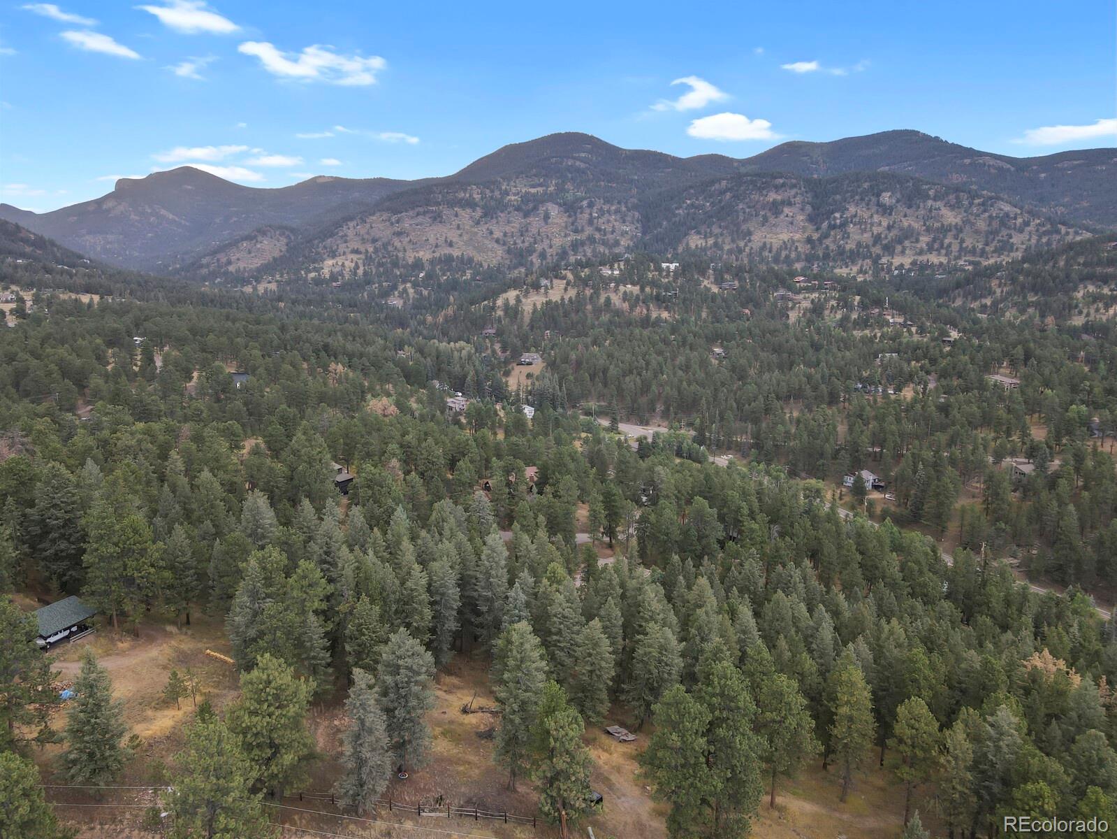 a view of mountain view with mountains in the background