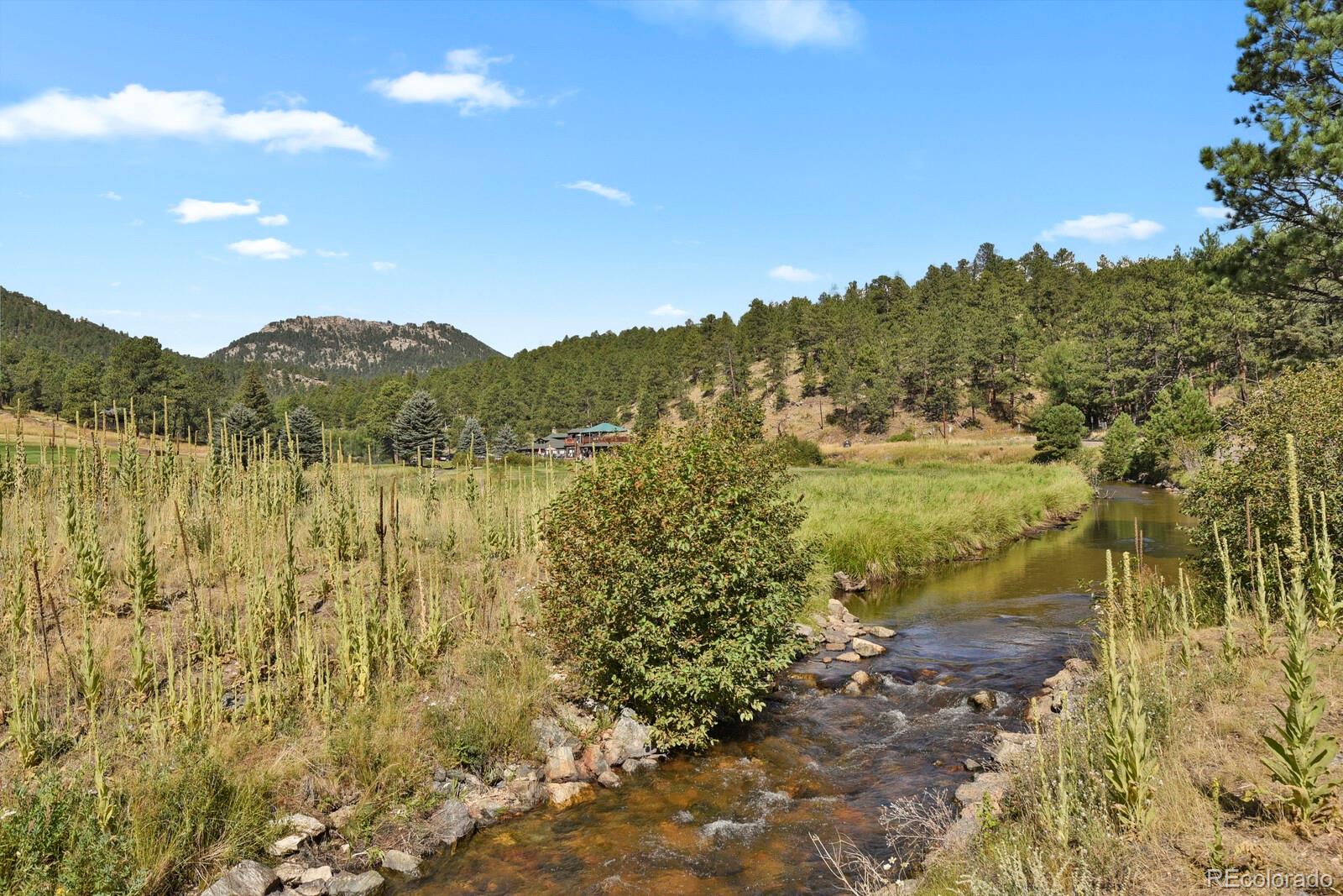 281 Kings Road Evergreen, CO 80439 - Photo 12 of 17 a view of lake with mountain