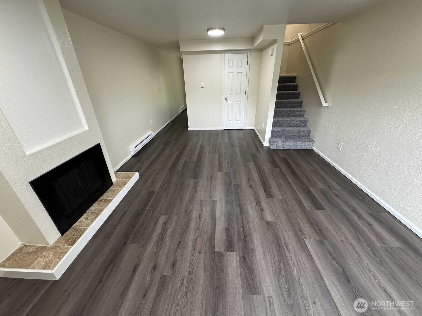 820 32nd Street Bellingham, WA 98225 - Photo 19 of 39 a view of a hallway with wooden floor and staircase