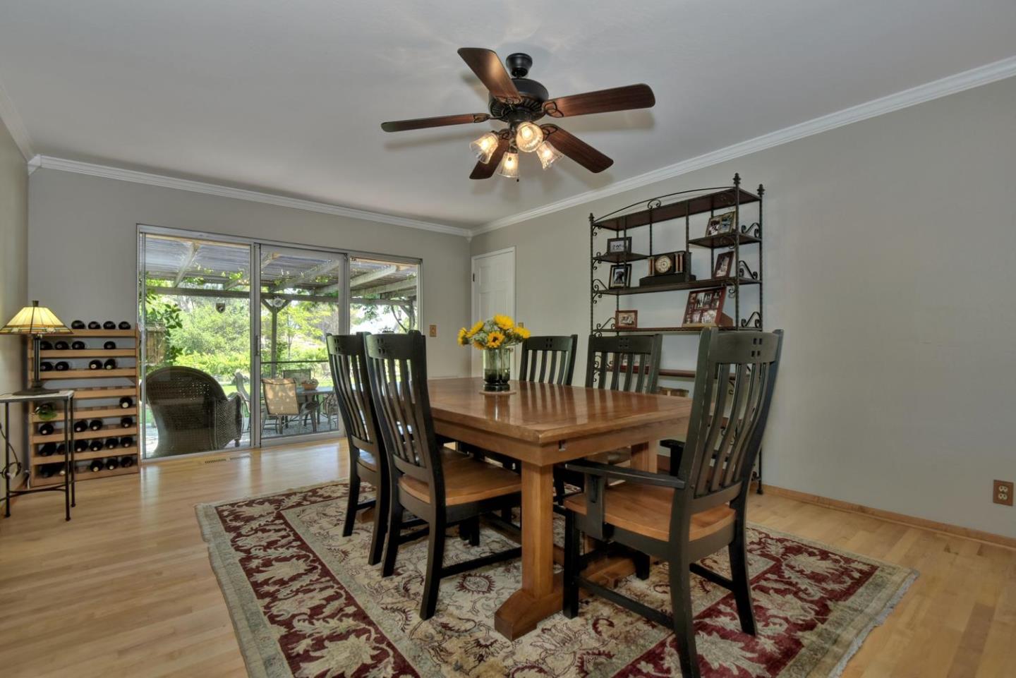 1175 Llagas Road Morgan Hill, CA 95037 - Photo 12 of 37 a dining room with furniture window and wooden floor