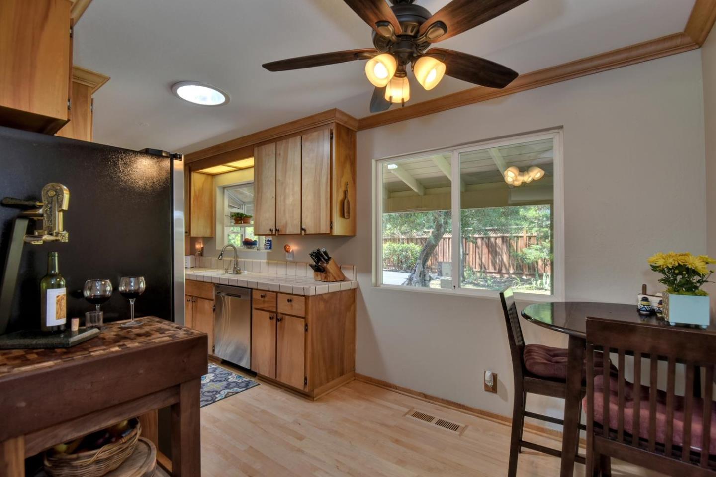 1175 Llagas Road Morgan Hill, CA 95037 - Photo 15 of 37 a view of a dining room with furniture window and outside view