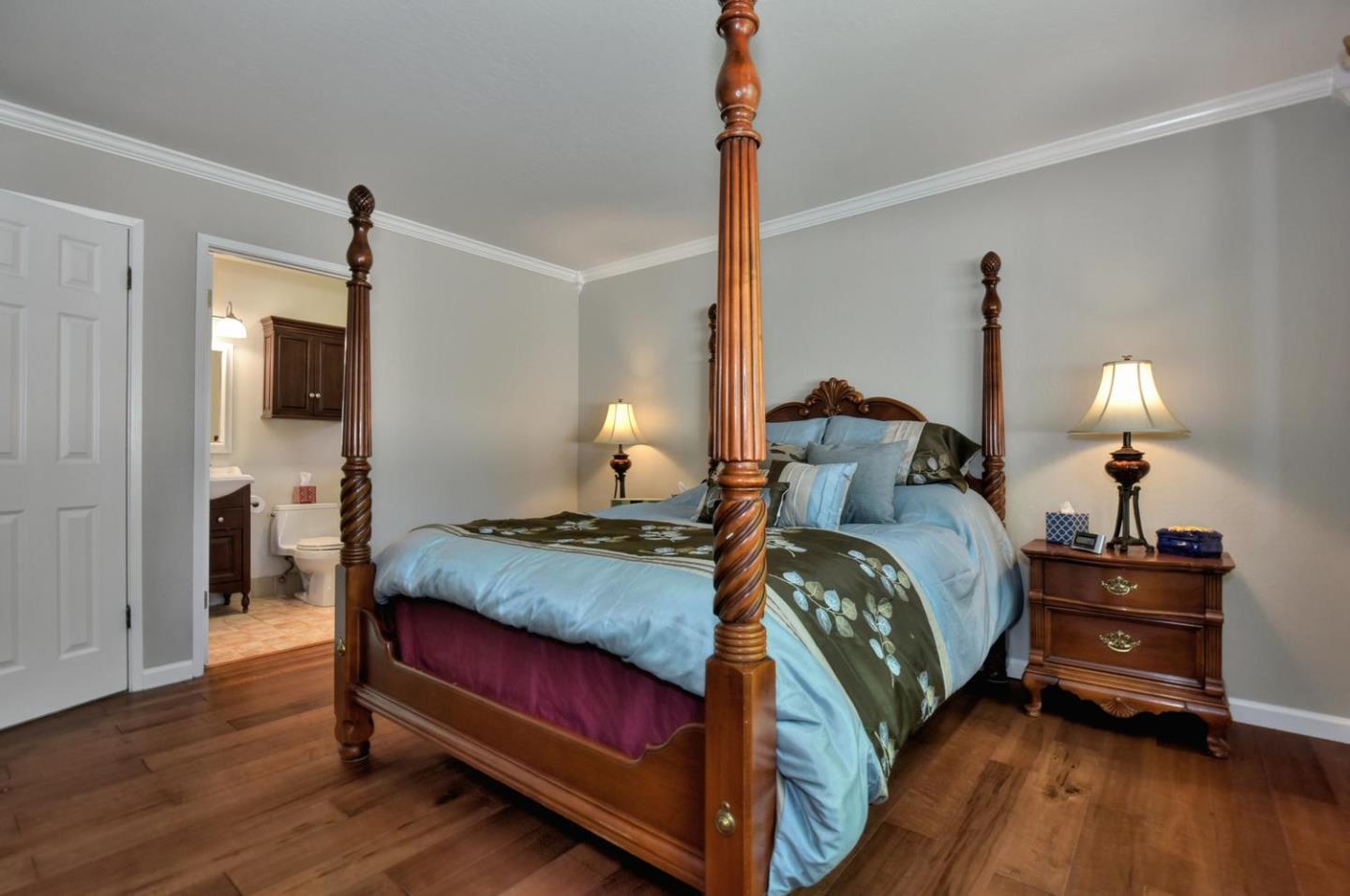 1175 Llagas Road Morgan Hill, CA 95037 - Photo 17 of 37 a bedroom with a bed and wooden floor