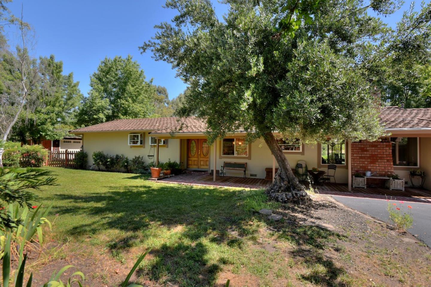 1175 Llagas Road Morgan Hill, CA 95037 - Photo 6 of 37 a front view of house with yard outdoor seating and green space