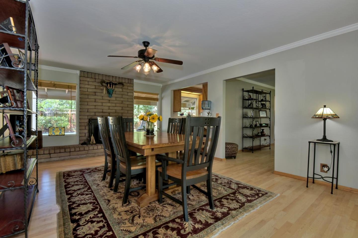 1175 Llagas Road Morgan Hill, CA 95037 - Photo 10 of 37 a view of a dining room with furniture window and wooden floor