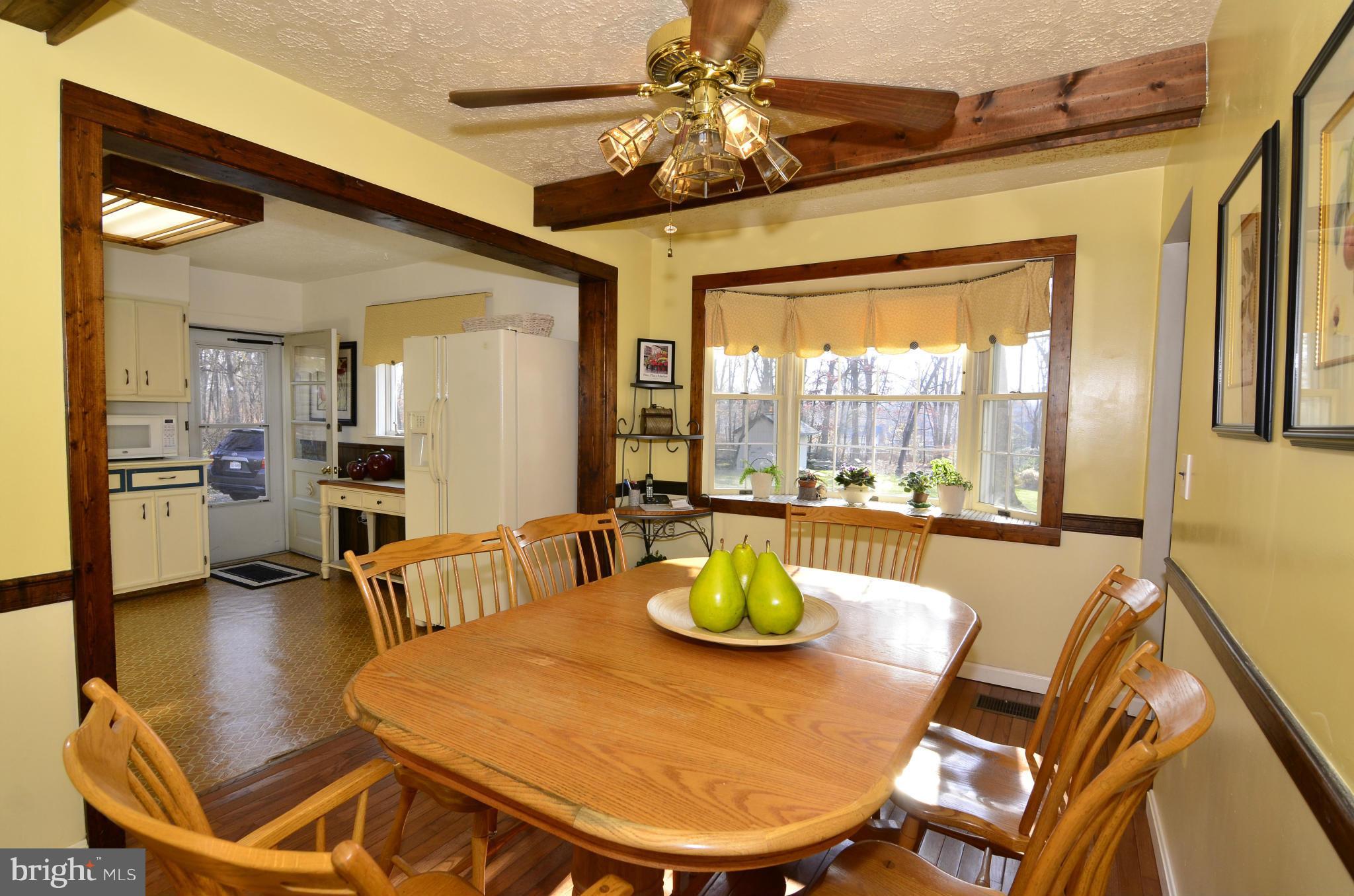 8725 Pohick Road Springfield, VA 22153 - Photo 6 of 22 The dining room opens to the kitchen.