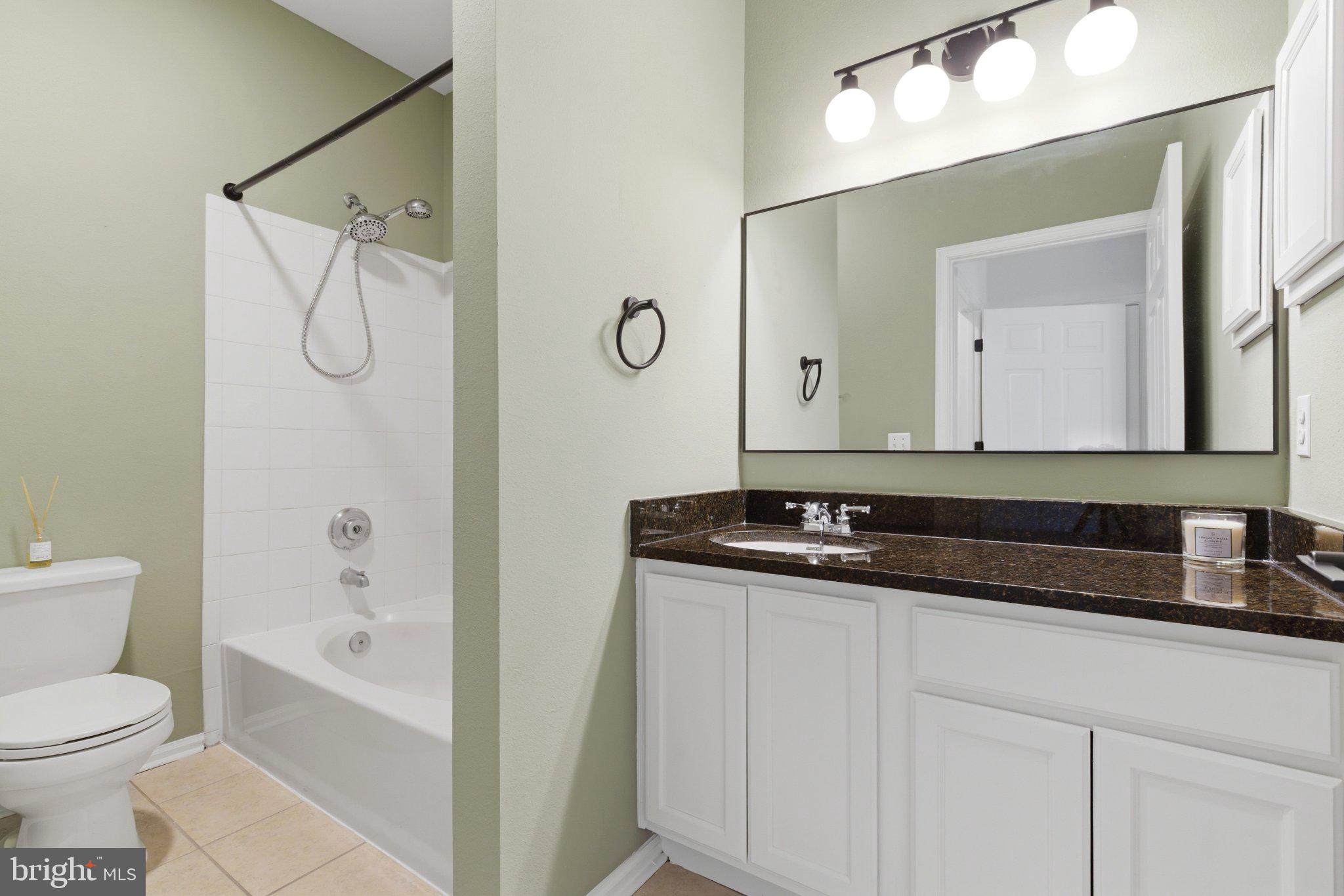 1580 Spring Gate Dr., Unit 4303 McLean, VA 22102 - Photo 12 of 41 Modern bathroom with elegant finishes.