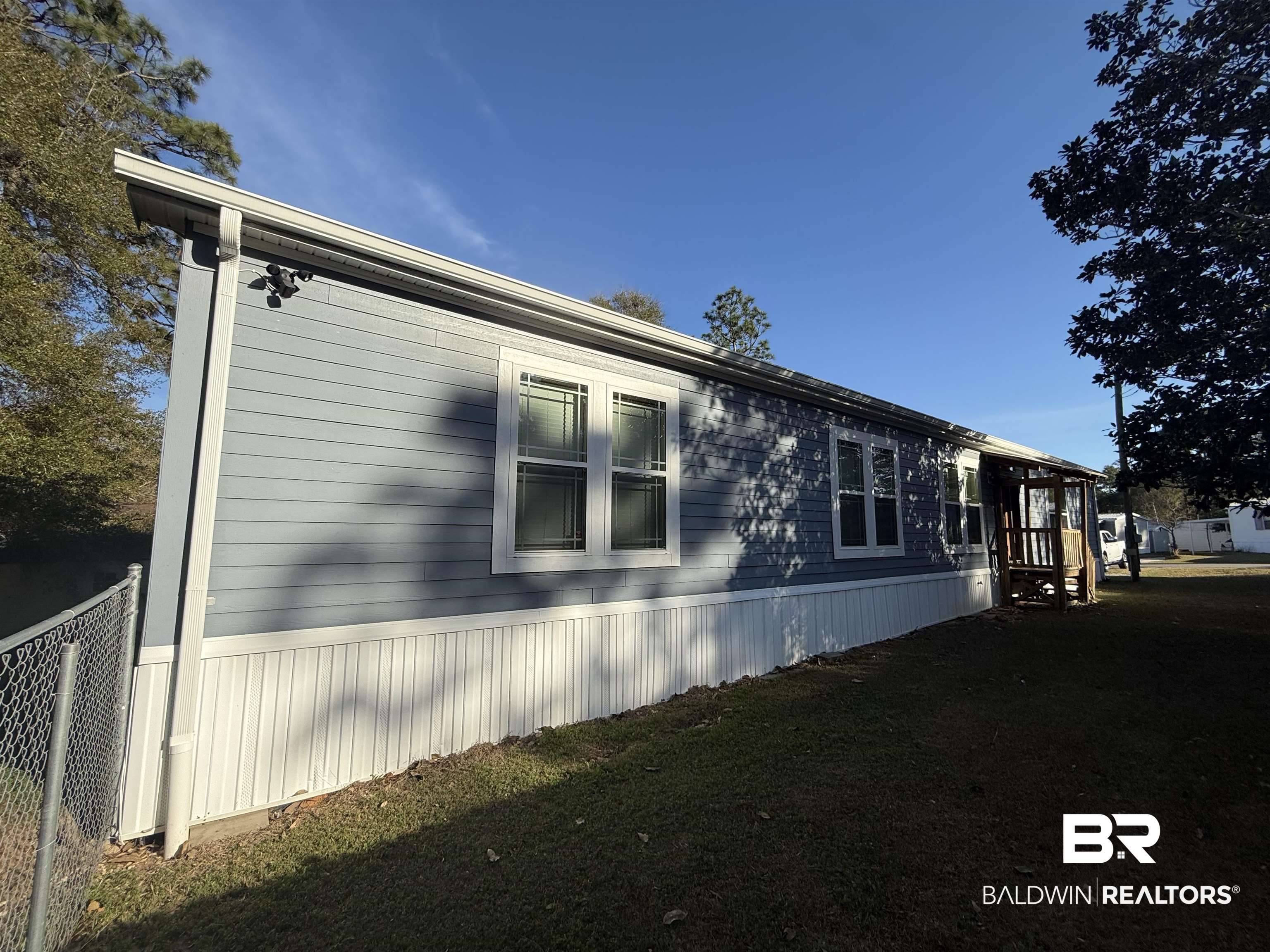 1274 Caney Loop Lillian, AL 36549 - Photo 4 of 19 View of side of property