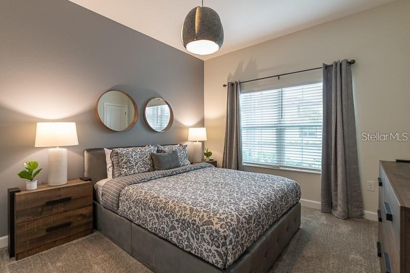 5025 Windermere Avenue Kissimmee, FL 34746 - Photo 9 of 33 a bedroom with a bed and window