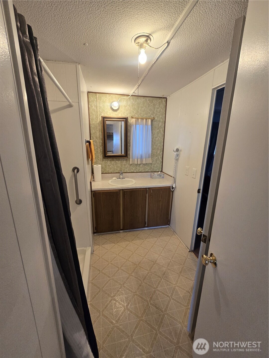 2302 R Street Southeast, Unit 115 Auburn, WA 98002 - Photo 22 of 33 a view of an empty room