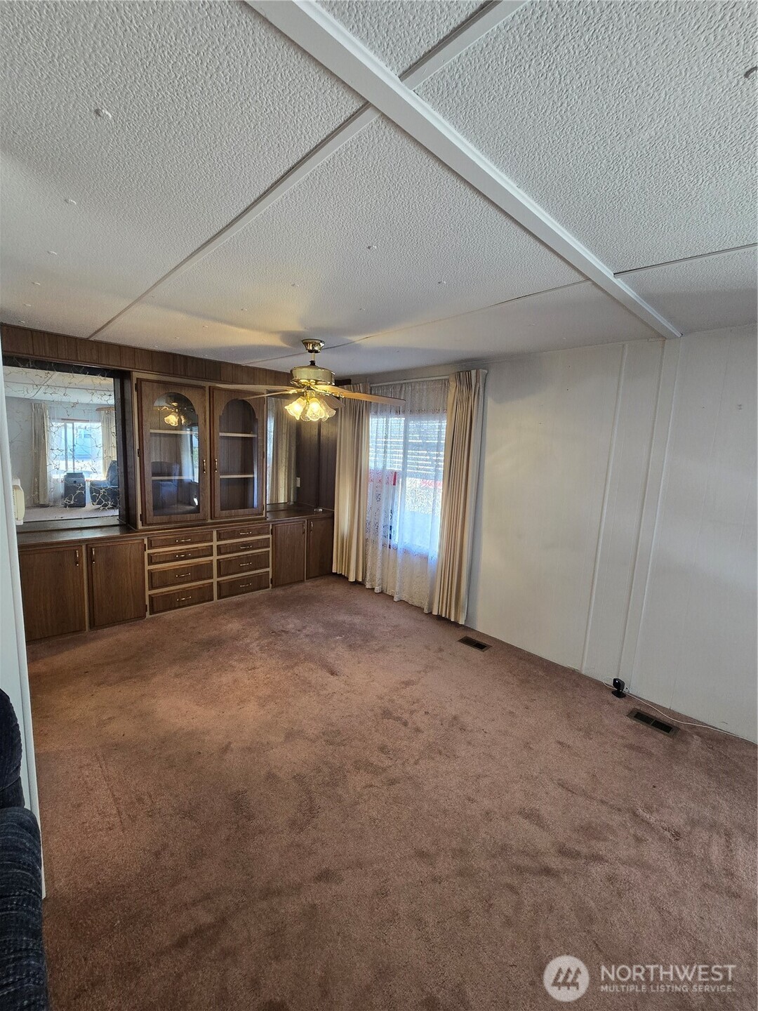 2302 R Street Southeast, Unit 115 Auburn, WA 98002 - Photo 9 of 33 a view of an empty room