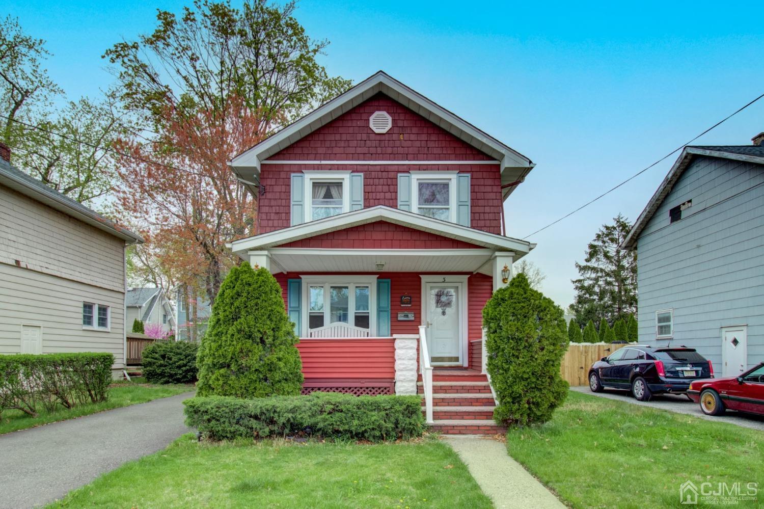 3 Division Street Metuchen, NJ 08840 - Photo 1 of 20 a front view of a house with a garden