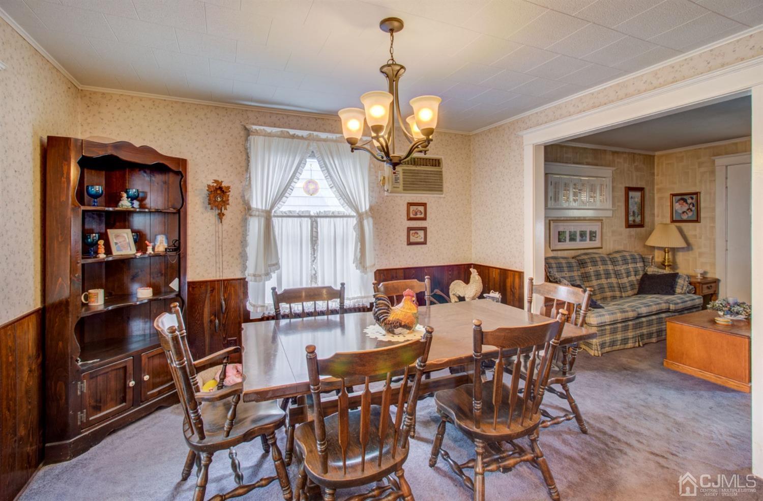 3 Division Street Metuchen, NJ 08840 - Photo 13 of 20 a view of a dining room with furniture window and wooden floor