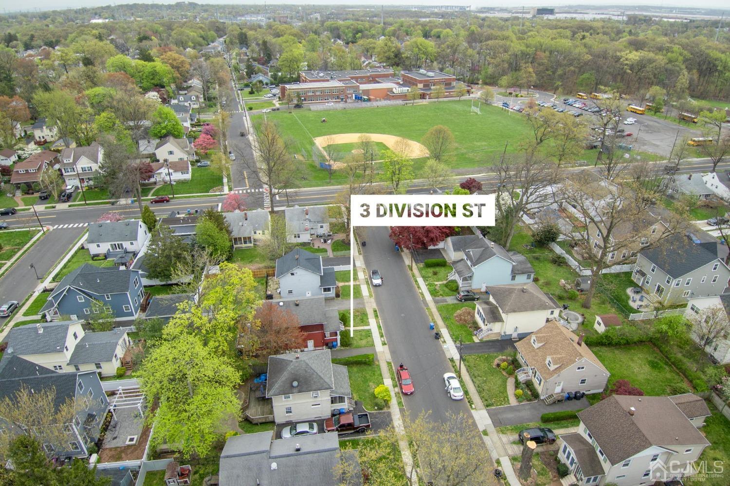 3 Division Street Metuchen, NJ 08840 - Photo 2 of 20 an aerial view of residential houses with outdoor space and parking