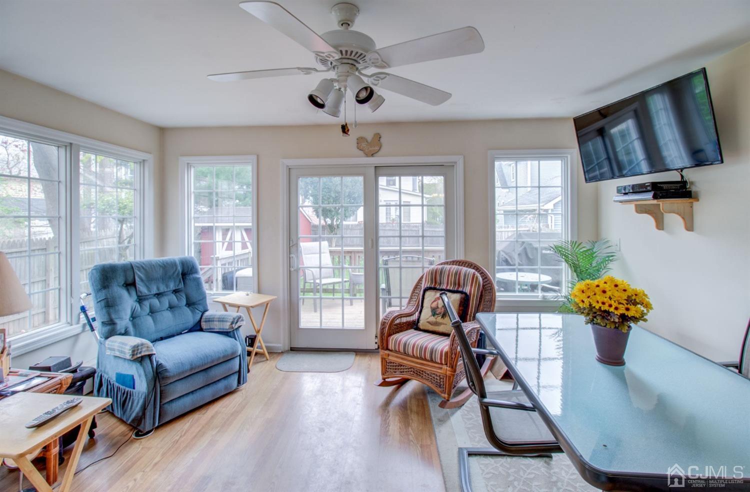 3 Division Street Metuchen, NJ 08840 - Photo 6 of 20 a living room with furniture and wooden floor