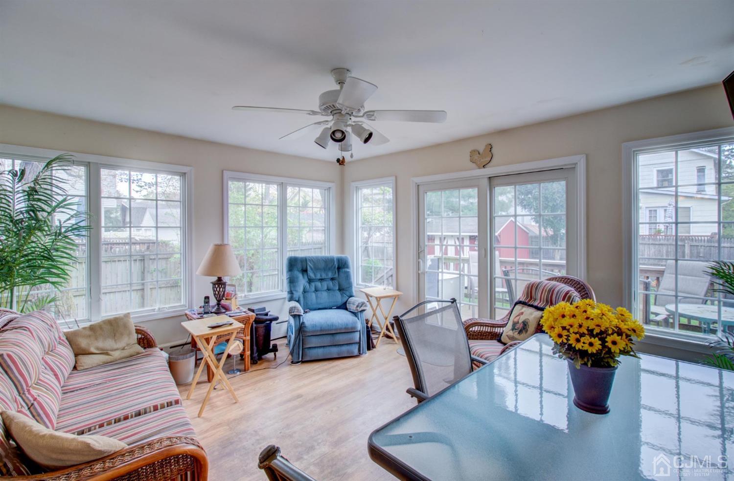 3 Division Street Metuchen, NJ 08840 - Photo 8 of 20 a living room with furniture or couch and a potted plant