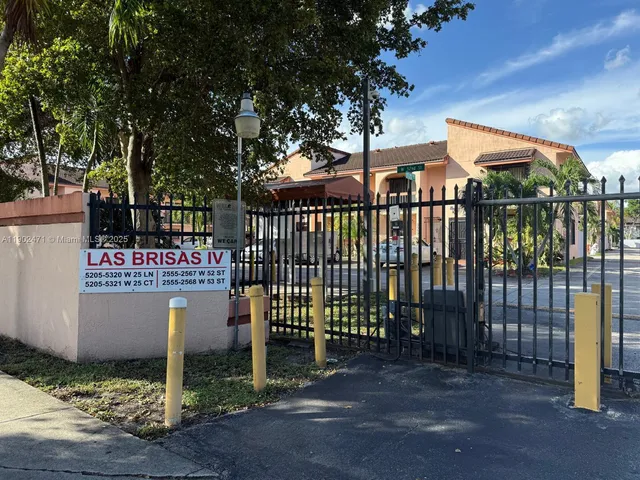 a sign board with parking space