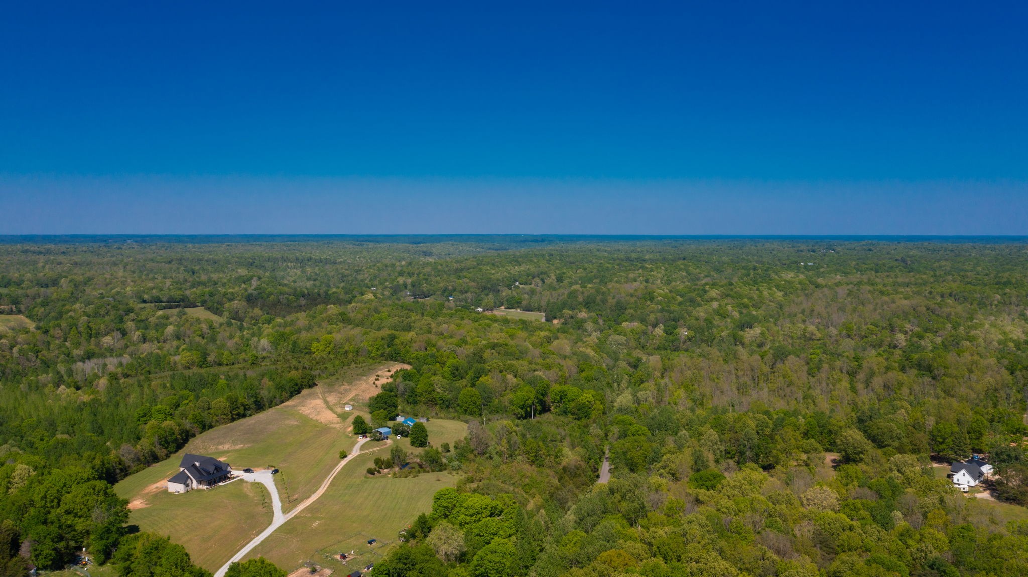 881 Coaling Road Charlotte, TN 37036 - Photo 27 of 29 an aerial view of residential houses with outdoor space and trees
