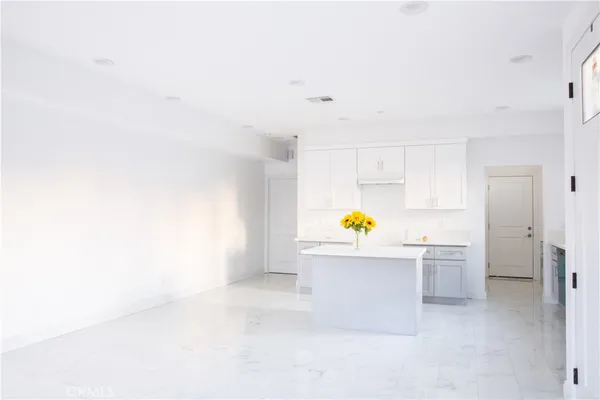 a view of a kitchen with a sink