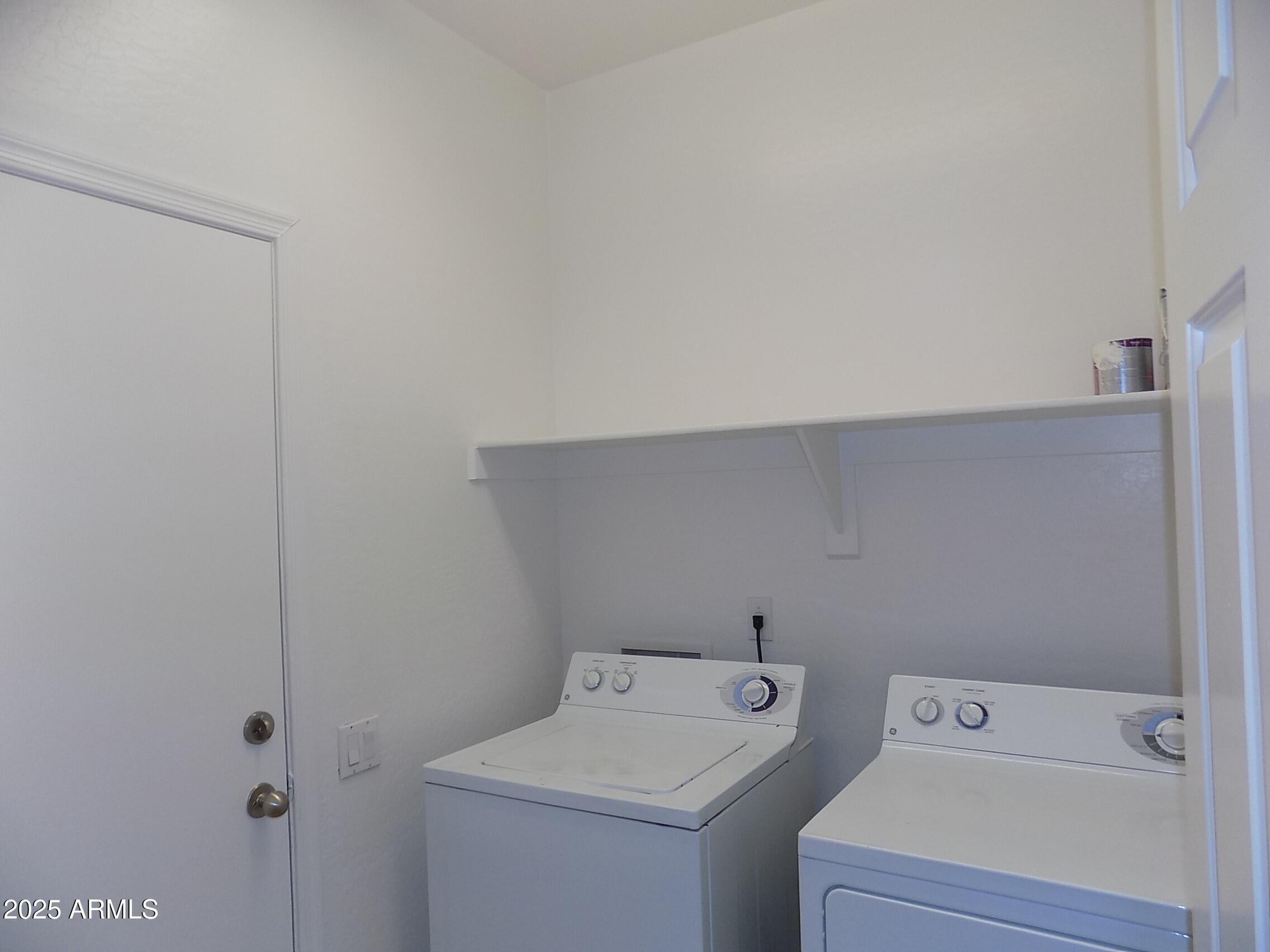 5423 West Shumway Farm Road Laveen, AZ 85339 - Photo 8 of 21 a utility room with dryer and washer