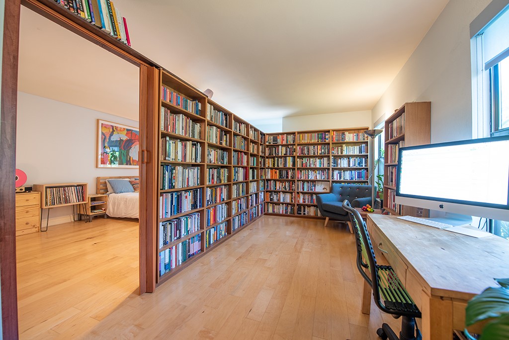 3609 Clawson Road, Unit A Austin, TX 78704 - Photo 6 of 17 Built-in shelving creates an impressive library and study, leading to a private bedroom space.