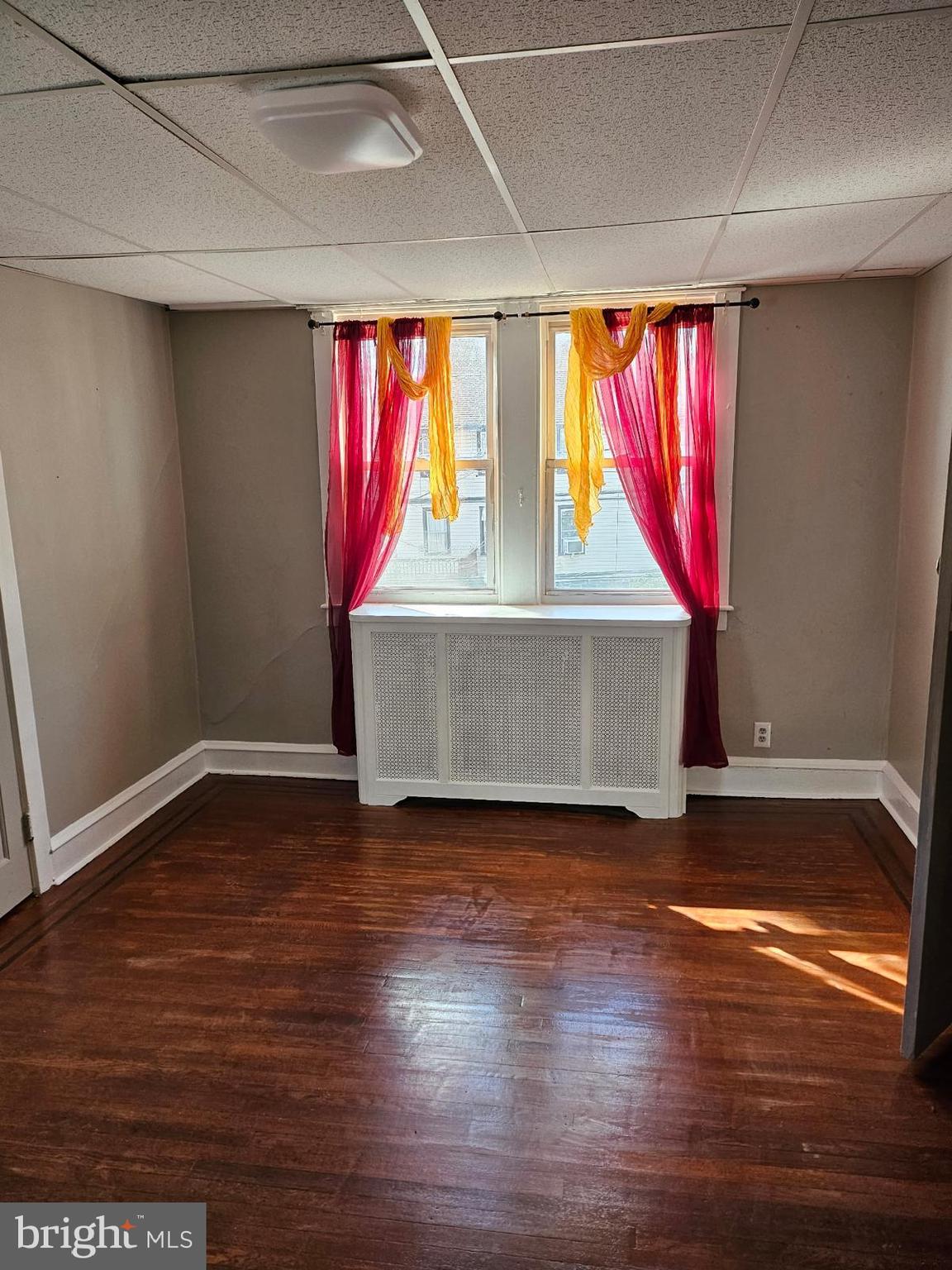 45-120 Oak Avenue Lansdowne, PA 19050 - Photo 1 of 24 a view of a room with wooden floor and windows