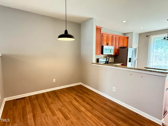 a room with window and a wooden floor