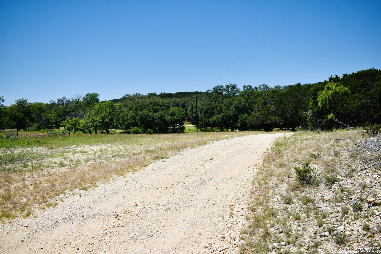 Lot 53 Clearwater Canyon Road Bandera, TX 78003 - Photo 23 of 25 a view of swimming pool with a yard
