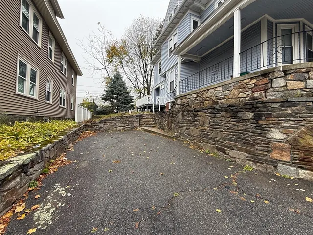 a view of a house with a street