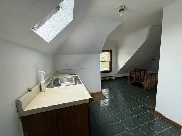 a view of a livingroom with a staircase