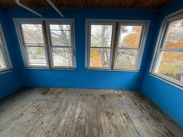 a glass door with a shower