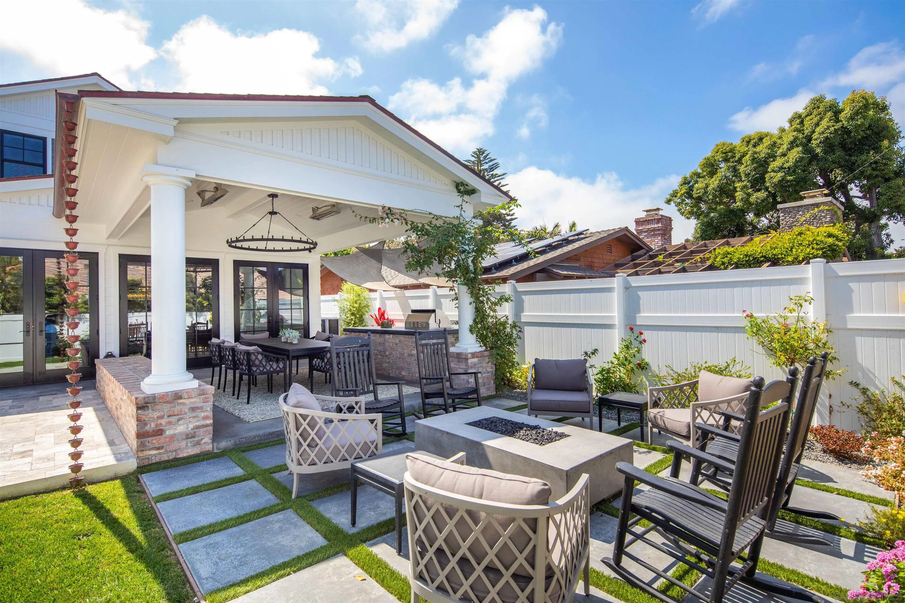 1 Pine Court Coronado, CA 92118 - Photo 12 of 46 a view of a patio with table and chairs and potted plants