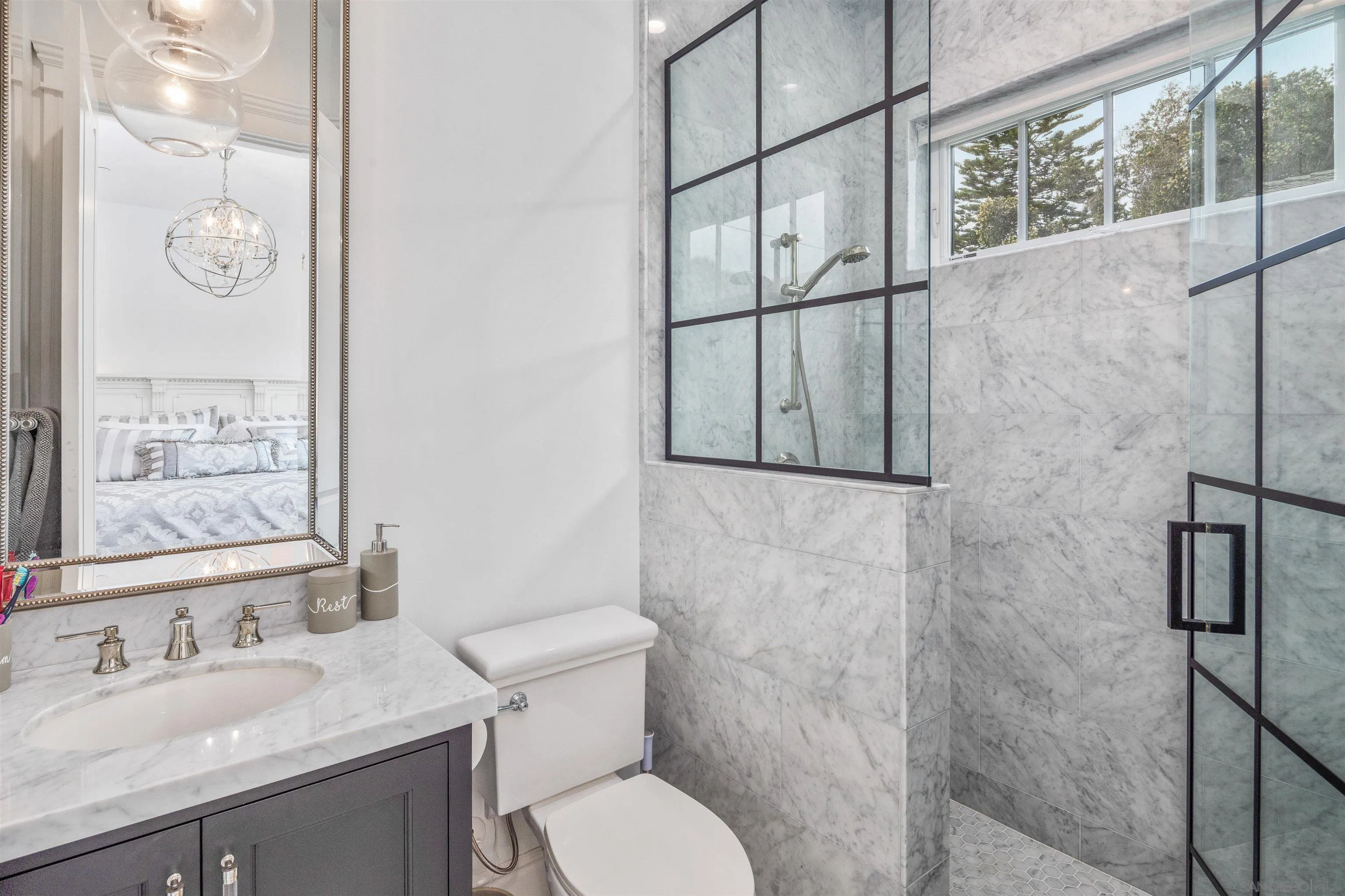 1 Pine Court Coronado, CA 92118 - Photo 19 of 46 a bathroom with a granite countertop sink toilet and shower