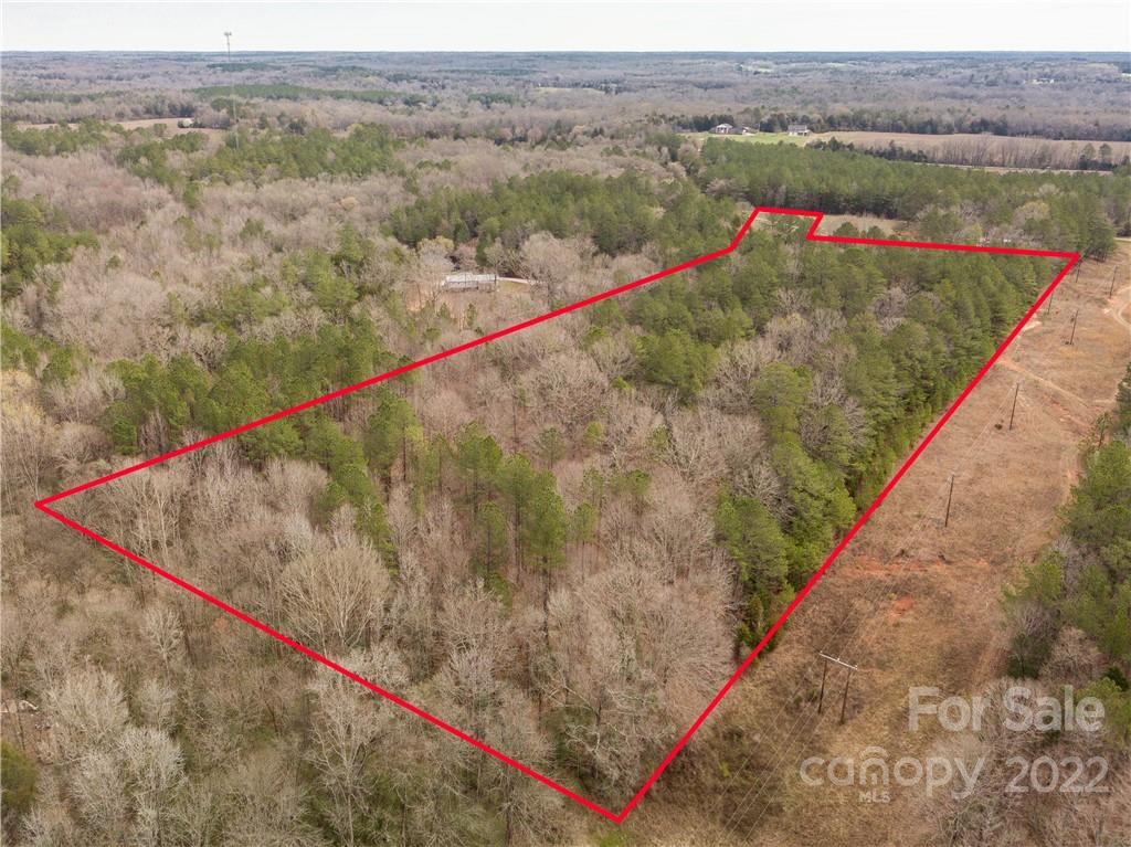 461 Deer Run Road Lancaster, SC 29720 - Photo 1 of 7 a view of a pathway with a lake view