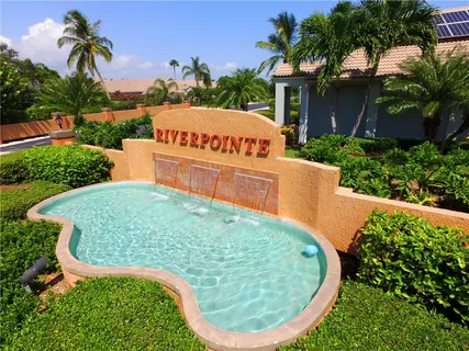 a view of a swimming pool from a balcony