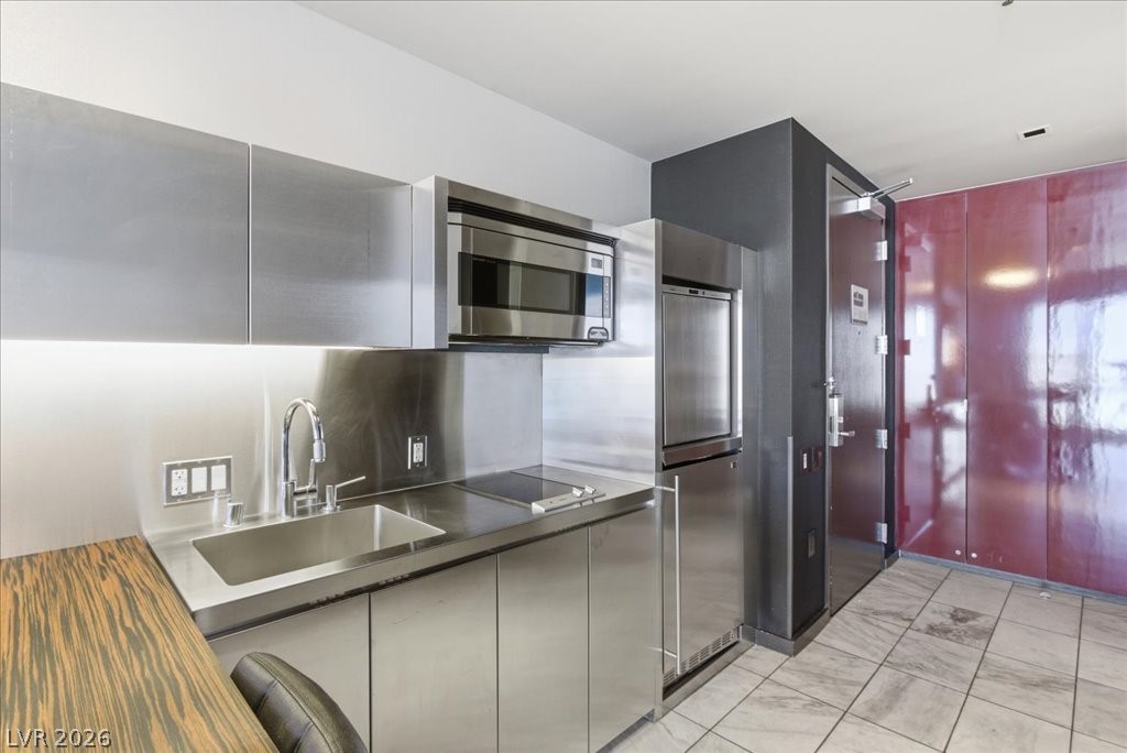 4381 West Flamingo Road, Unit 10306 Las Vegas, NV 89103 - Photo 3 of 26 This compact culinary space offers seamless functionality and modern design.