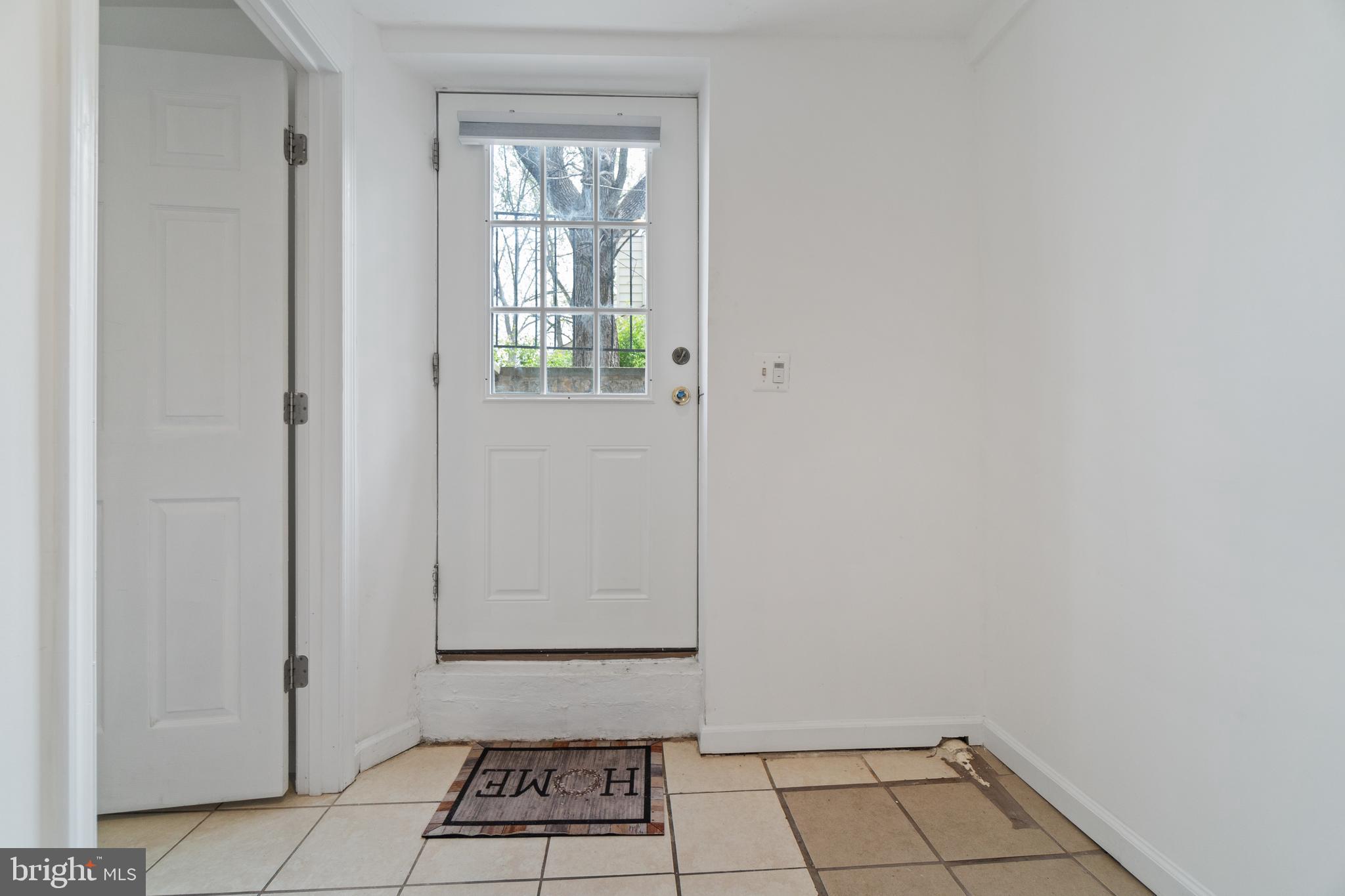 4807 Randolph Road Rockville, MD 20852 - Photo 31 of 42 Basement Side Entrance Foyer