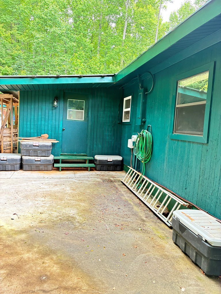 521 Sunnyside Road Hiawassee, GA 30546 - Photo 12 of 33 Back of Cabin, Additional Parking area