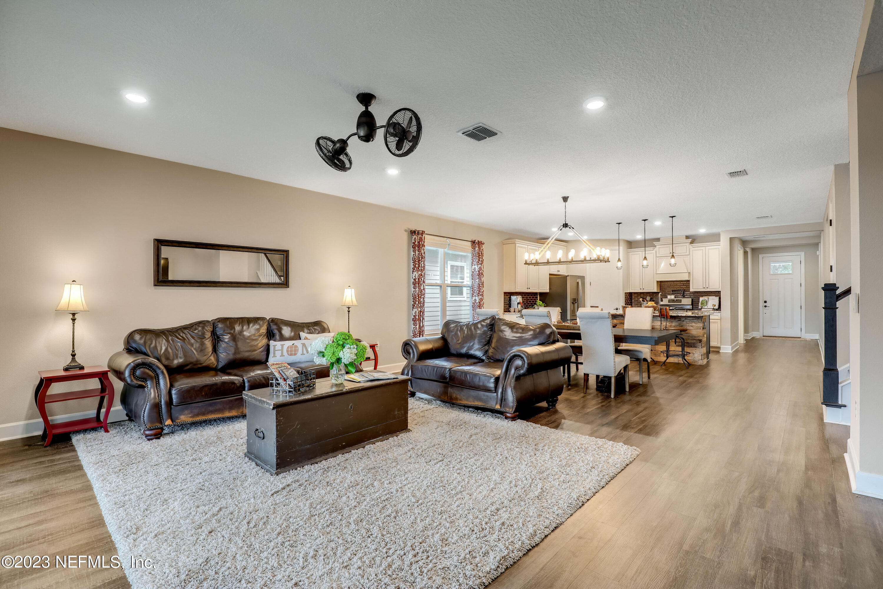 85248 Champlain Drive Fernandina Beach, FL 32034 - Photo 21 of 79 a living room with furniture and wooden floor