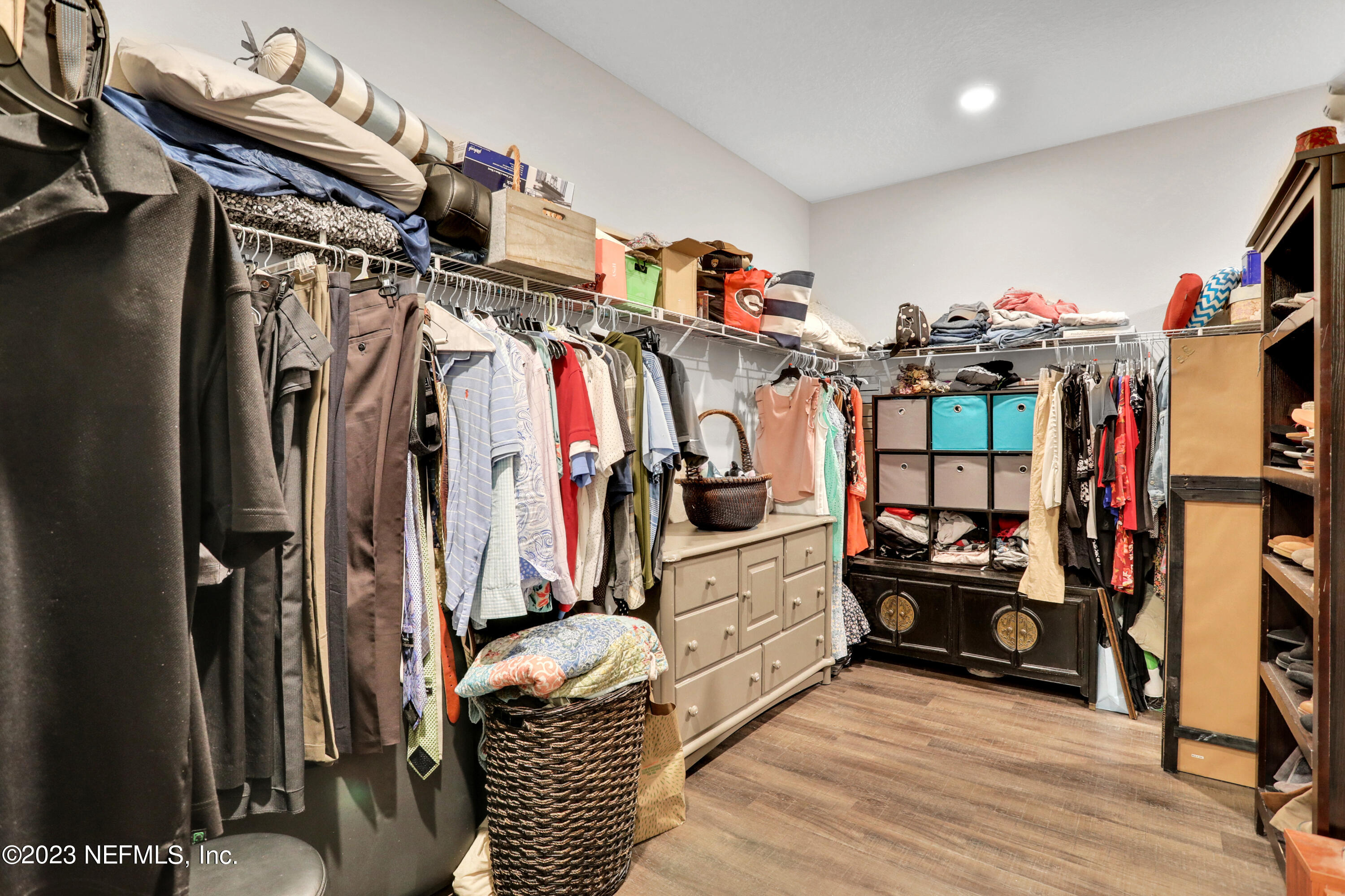 85248 Champlain Drive Fernandina Beach, FL 32034 - Photo 29 of 79 a view of walk in closet with clothes and shoes