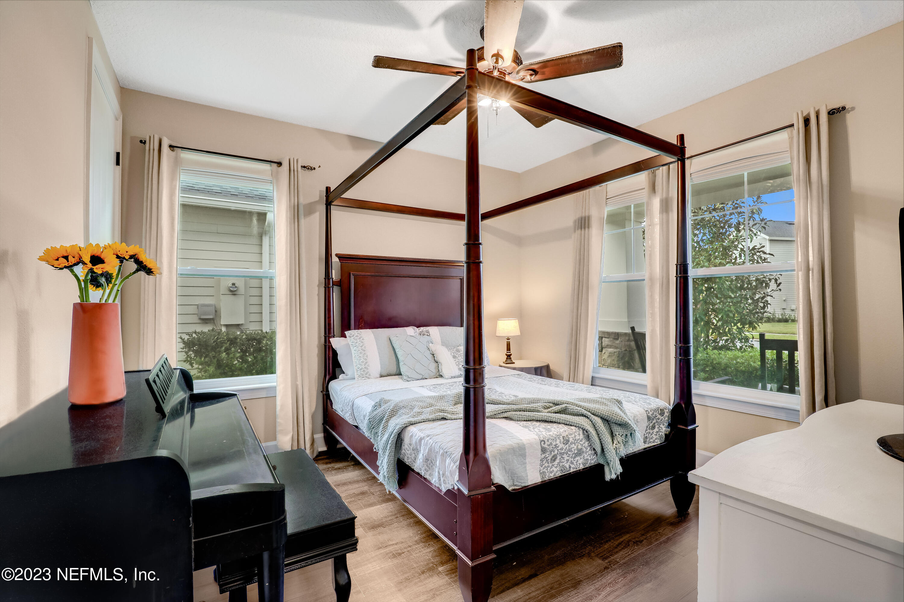 85248 Champlain Drive Fernandina Beach, FL 32034 - Photo 34 of 79 a bedroom with a bed window and couch