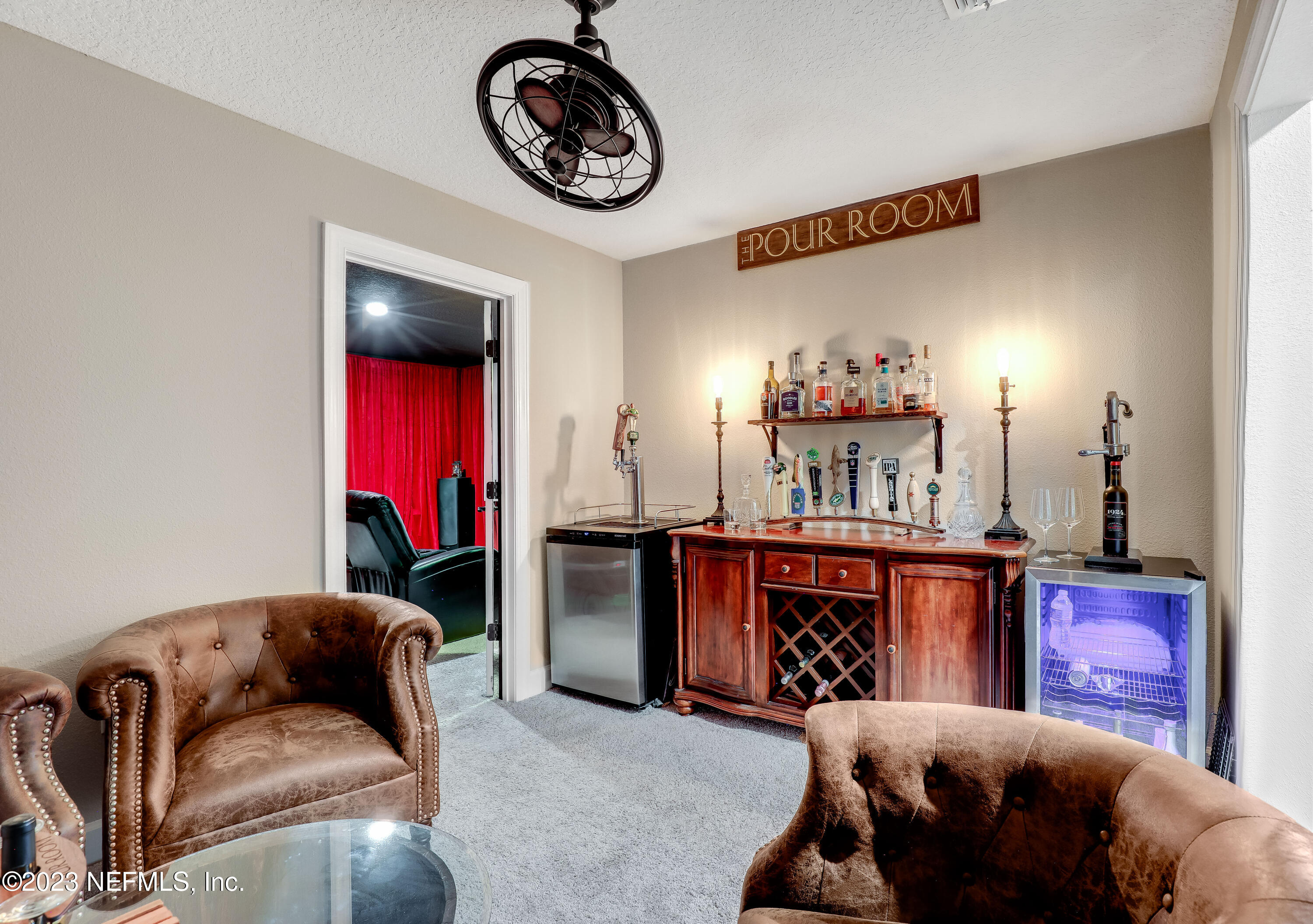 85248 Champlain Drive Fernandina Beach, FL 32034 - Photo 42 of 79 a living room with furniture and a fireplace