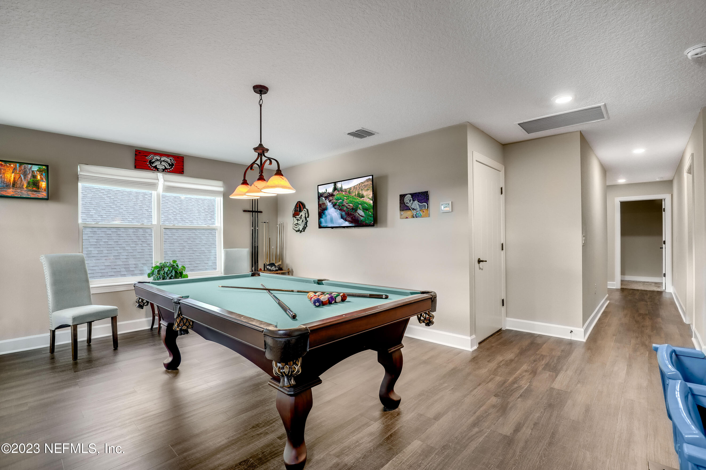 85248 Champlain Drive Fernandina Beach, FL 32034 - Photo 47 of 79 a living room with furniture pool table and wooden floor
