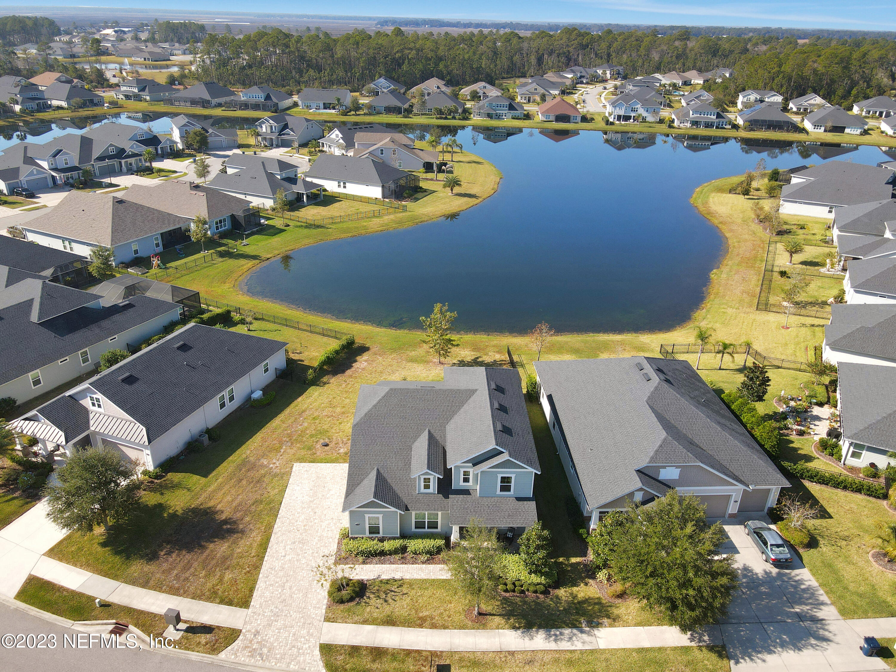 85248 Champlain Drive Fernandina Beach, FL 32034 - Photo 6 of 79 an aerial view of residential houses with outdoor space