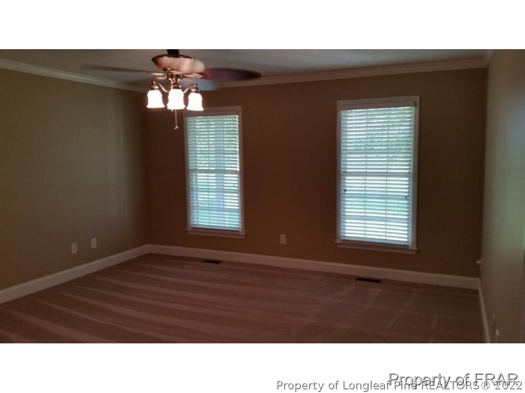 5265 Stewart Road Wade, NC 28395 - Photo 11 of 26 a black and white photo of a living room