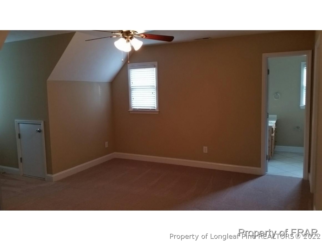 5265 Stewart Road Wade, NC 28395 - Photo 16 of 26 a black and white photo of a living room