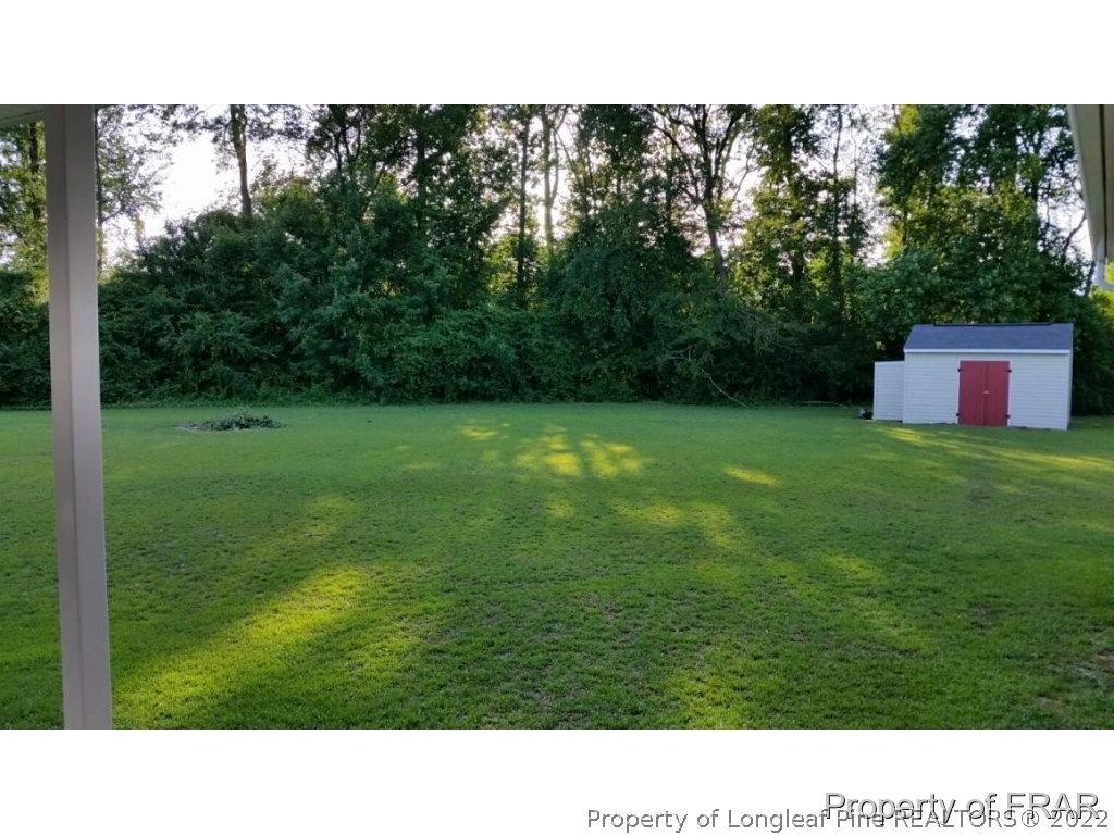 5265 Stewart Road Wade, NC 28395 - Photo 25 of 26 a open area with green field