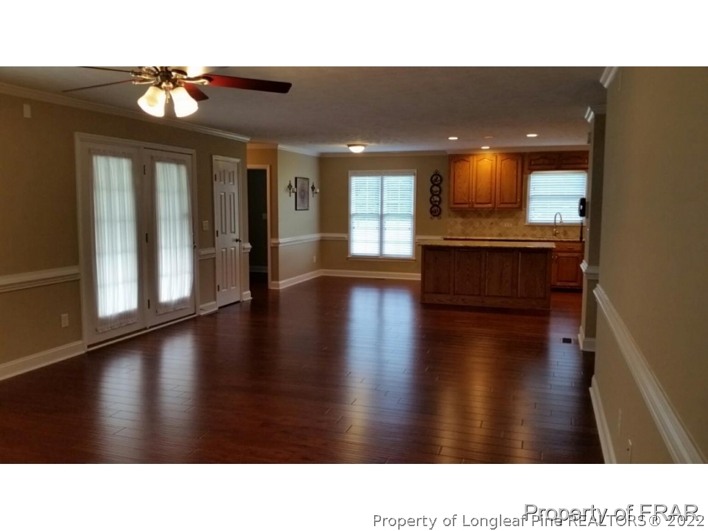 5265 Stewart Road Wade, NC 28395 - Photo 6 of 26 a black and white photo of a living room
