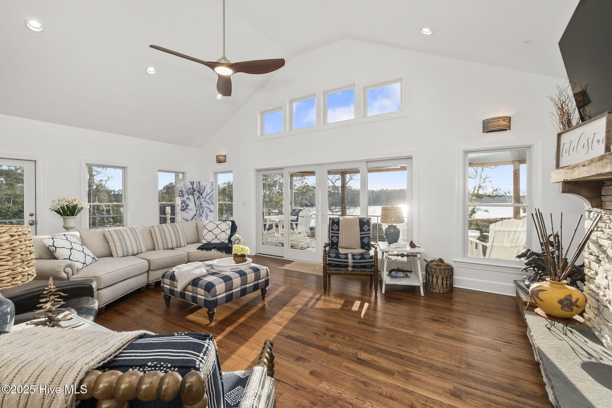 347 Osprey Point Road Beaufort, NC 28516 - Photo 4 of 81 Open living area w/ fireplace & views