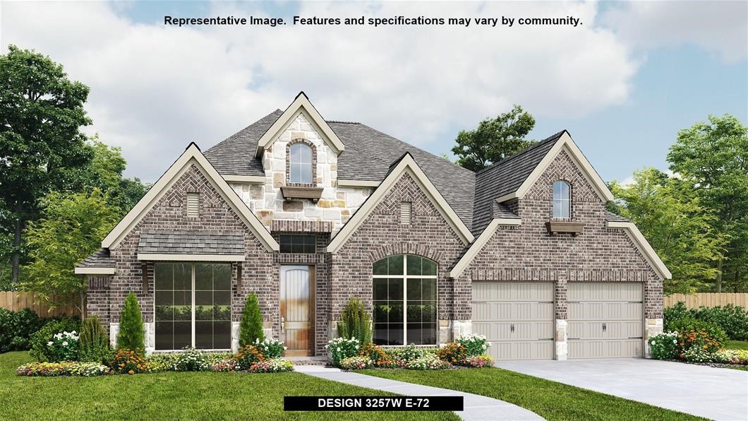 505 Trout River Road Kyle, TX 78640 - Photo 1 of 1 a front view of a house with a yard and garage