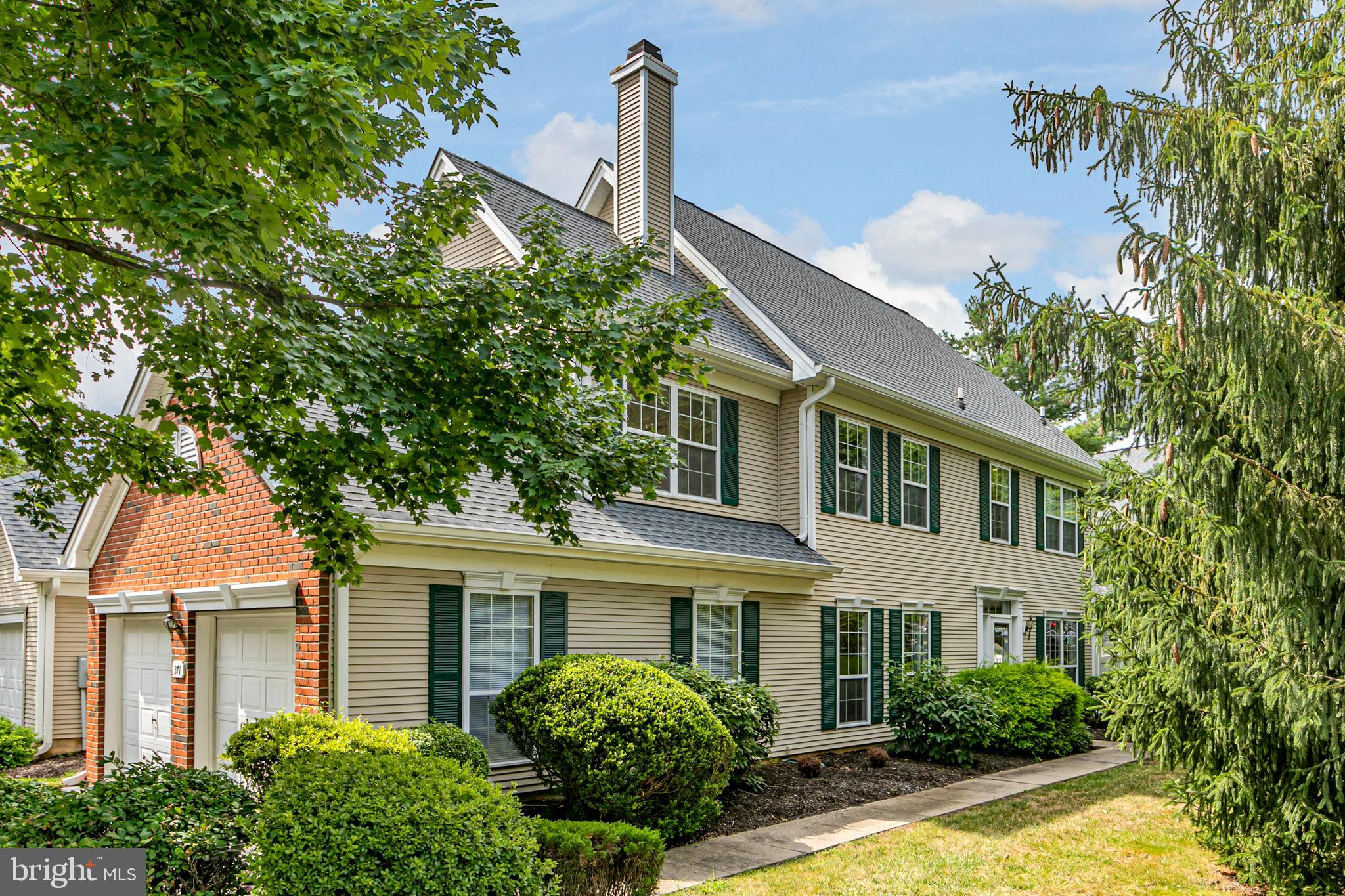 371 Watkins Road Pennington, NJ 08534 - Photo 1 of 42 a front view of a house with yard and green space